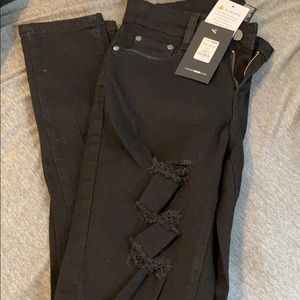 Black fashion nova distressed jeans